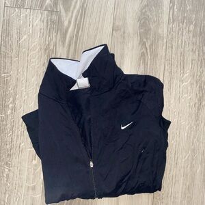 Nike workout jacket . No stains or holes but well used